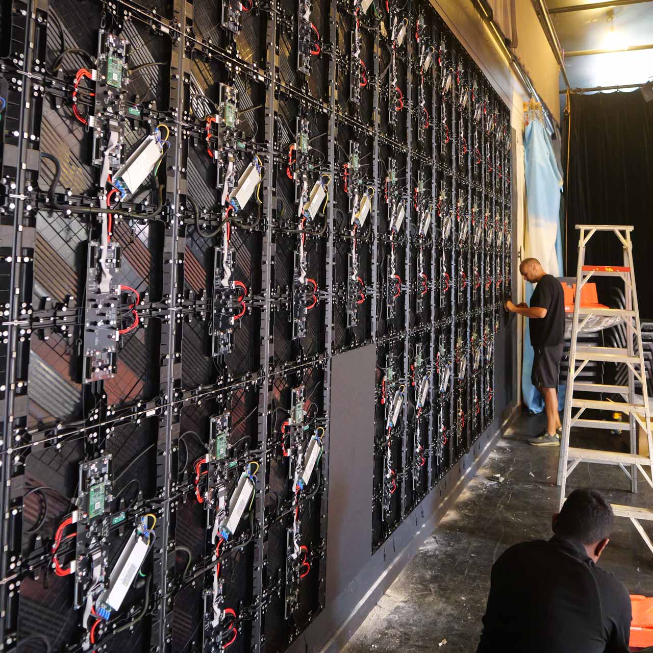 LED screen panel installation Auckland — fitting individual LED modules to the frame